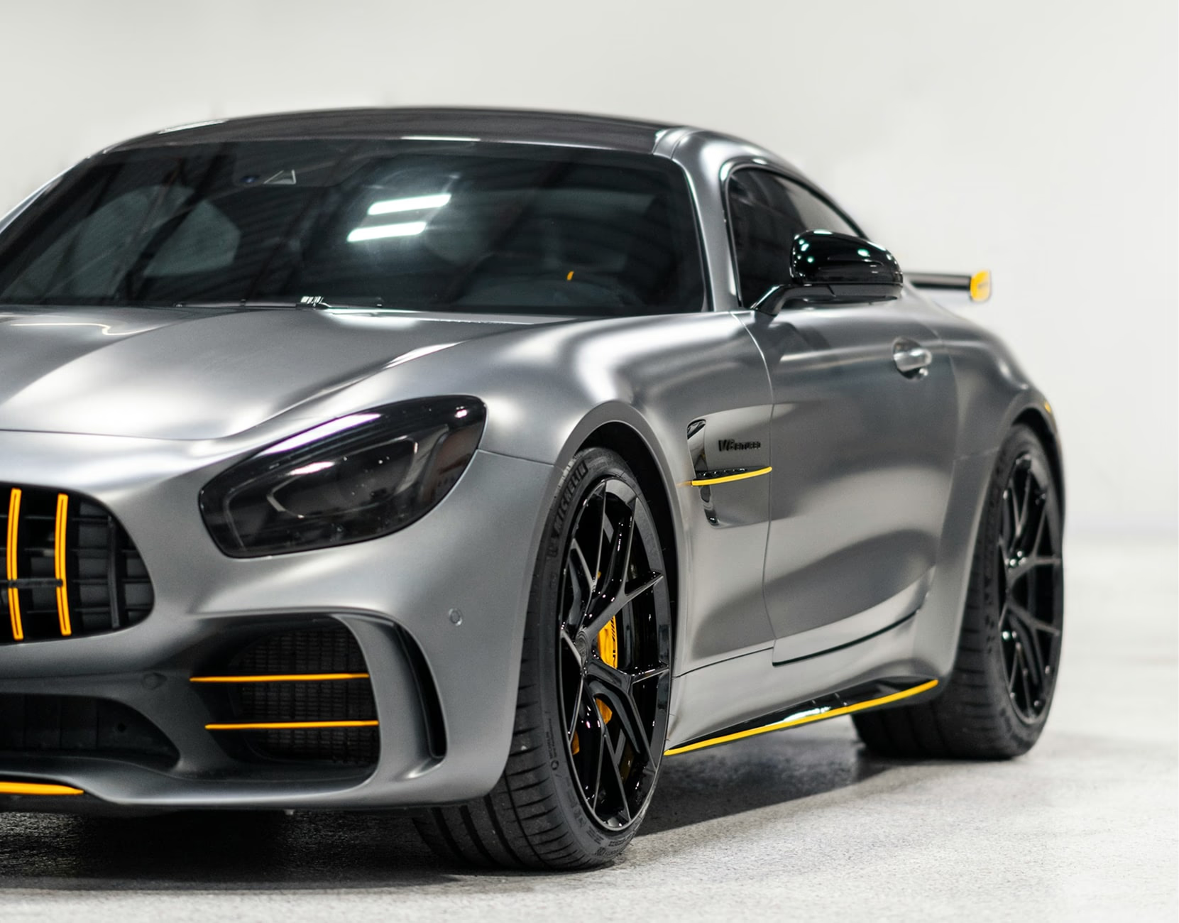 High-end vehicle with mirror-like paint — professional detailing